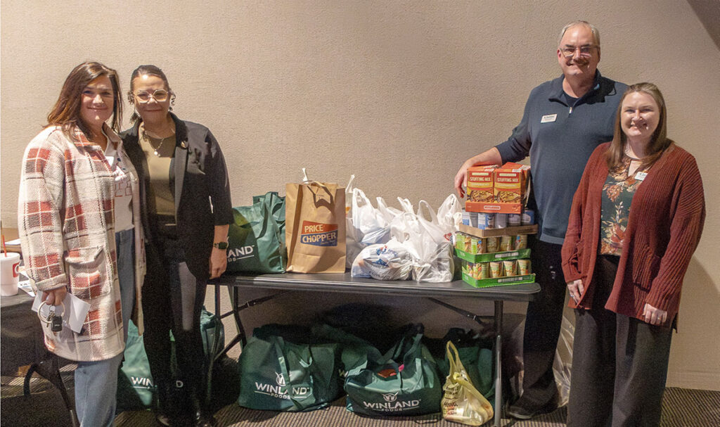 Excelsior Springs Chamber Food Drive photo with Meet the Need and the Good Samaritan Center reps